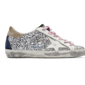 Golden Goose Superstar Silver and White Sneakers.